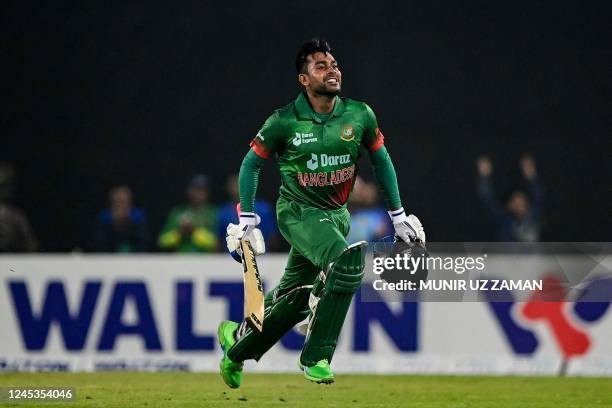 Bangladesh's Mahidy Hassan Miraz celebrates after his teams's victory in the first one-day international cricket match between Bangladesh and India...