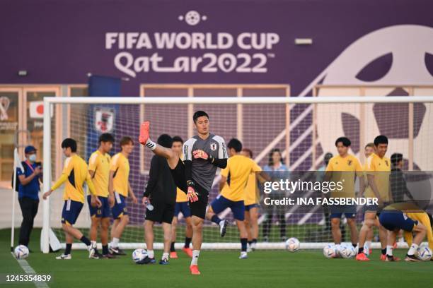Japan's goalkeeper Eiji Kawashima takes part in a training session at the Al Sadd SC training grounds in Doha on December 4 on the eve of the Qatar...