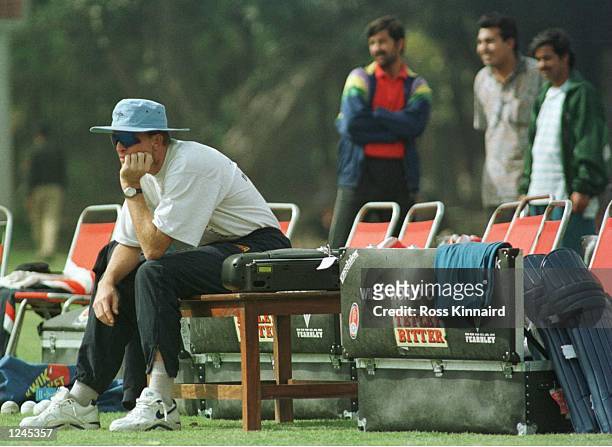 Dominic Cork of England sits out England's net session in Faisalbad, Pakistan. The Cricket World Cup is taking place in India, Pakistan and Sri...