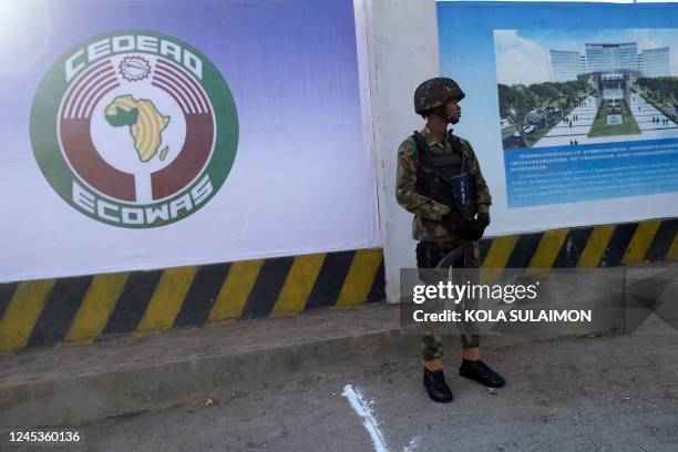 Nigerian soldier stand outside the new construction site of the headquartes of the Economic Community of West African States during the...