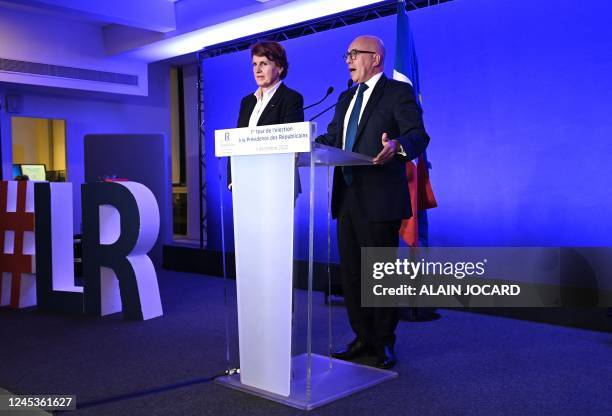 French LR party presidency candidate Eric Ciotti adresses a speech next to the Party's temporary president Annie Genevard at the Les Republicains...