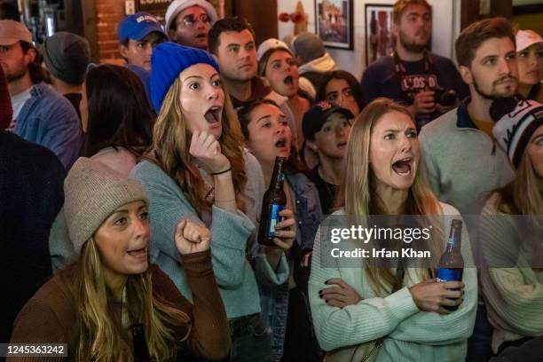 Hermosa Beach, CA Sloane Miras, left, Madeline Raab, and Teydin Hall react as U.S. Men's national team misses scoring against Netherlands, watching...