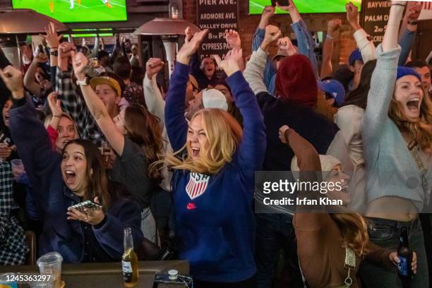 Hermosa Beach, CA Supporters celebrate as U.S. Men's national team scores their first and only goal against Netherlands, while watching World Cup...