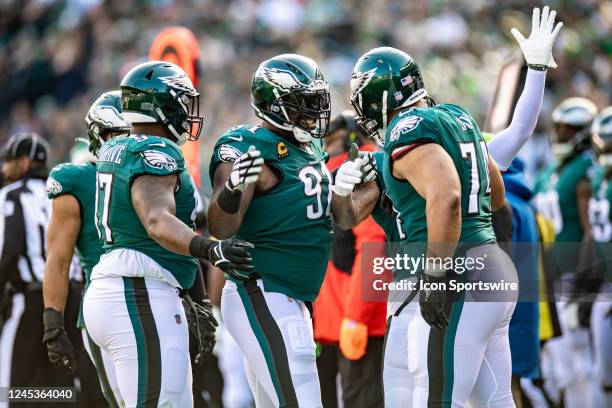 Philadelphia Eagles defensive tackle Fletcher Cox celebrates with teammates after making a defensive play during the first half of the National...