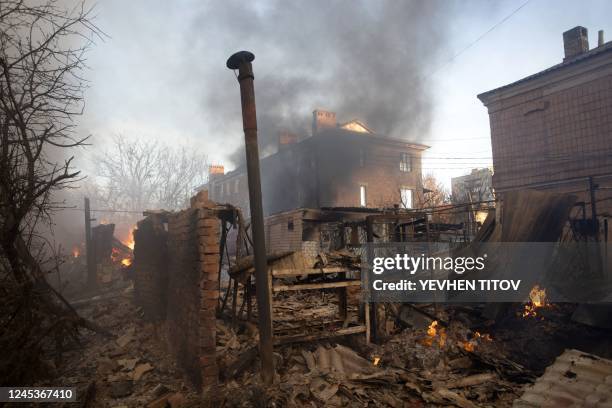 Building burns after shelling in Bakhmut, Donetsk region, on December 4 amid Russia's invasion of Ukraine.