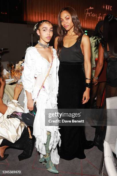 Twigs and Zoe Saldana attend the British Vogue 'Forces For Change' dinner hosted by Edward Enninful and Vanessa Kingori at The Londoner Hotel on...