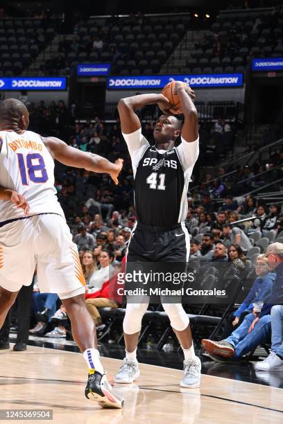 Gorgui Dieng of the San Antonio Spurs shoots the ball during the game against the Phoenix Suns on December 4, 2022 at the AT&T Center in San Antonio,...