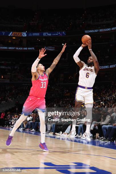 LeBron James of the Los Angeles Lakers shoots the ball during the game against the Washington Wizards on December 4, 2022 at Capital One Arena in...