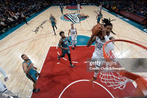 Ja Morant of the Memphis Grizzlies drives to the basket during the game against the Detroit Pistons on December 4, 2022 at Little Caesars Arena in...