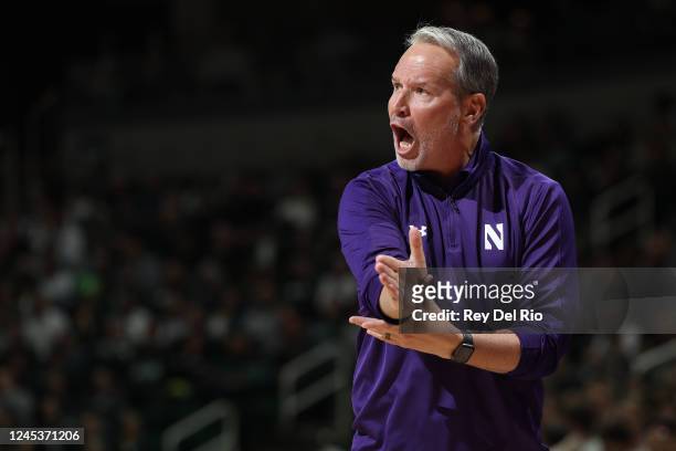 Head coach Chris Collins of the Northwestern Wildcats reacts in the first half of the game against the Michigan State Spartans at Breslin Center on...