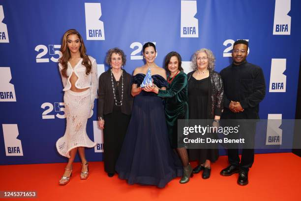 Yasmin Finney and Fisayo Akinade pose with Maysoon Pachachi, Darina Al Joundi, Meriam Abbas and guest, winners of the Best Ensemble Performance award...