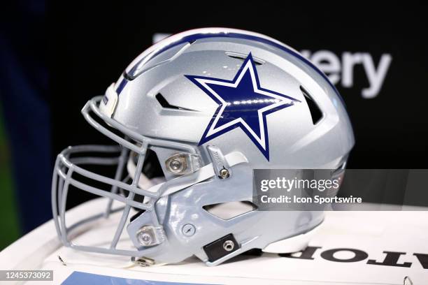 Dallas Cowboys helmet sits on a cart during and NFL game between the Indianapolis Colts and the Dallas Cowboys on December 04, 2022 at AT&T Stadium...