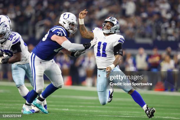 Indianapolis Colts offensive tackle Dennis Kelly blocks Dallas Cowboys linebacker Micah Parsons during the game between the Dallas Cowboys and the...