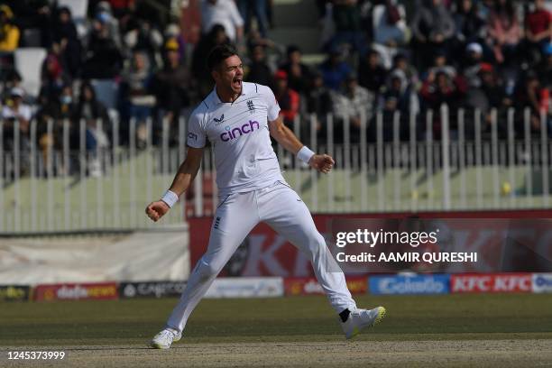England's James Anderson celebrates after taking the wicket of Pakistan's Mohammad Rizwan during the fifth and final day of the first cricket Test...