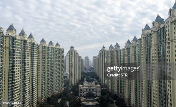 This aerial photo taken on December 3, 2022 shows a housing complex by Chinese property developer Evergrande in Huaian, in China's eastern Jiangsu...