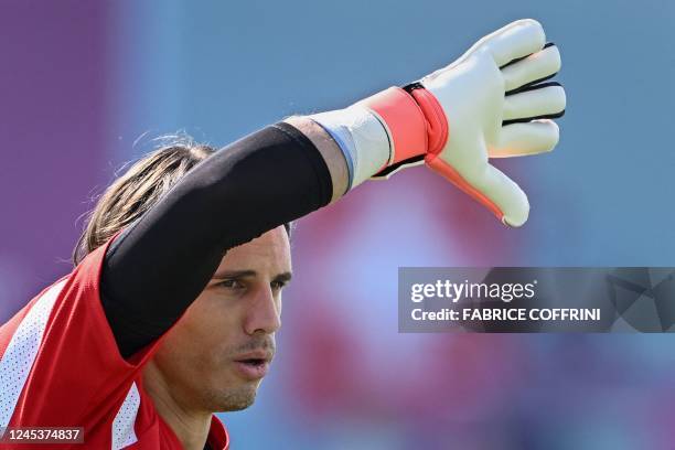 Switzerland's goalkeeper Yann Sommer takes part in a training session at the University of Doha training facilities in Doha on December 5 on the eve...