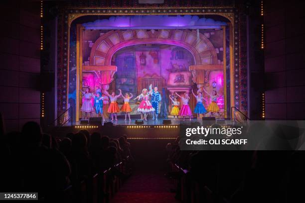 Actors Kimberly Hart-Simpson , playing Cinderella, and Lewis Devine , playing Buttons, in the Christmas pantomime 'Cinderella' at St Helens Theatre...