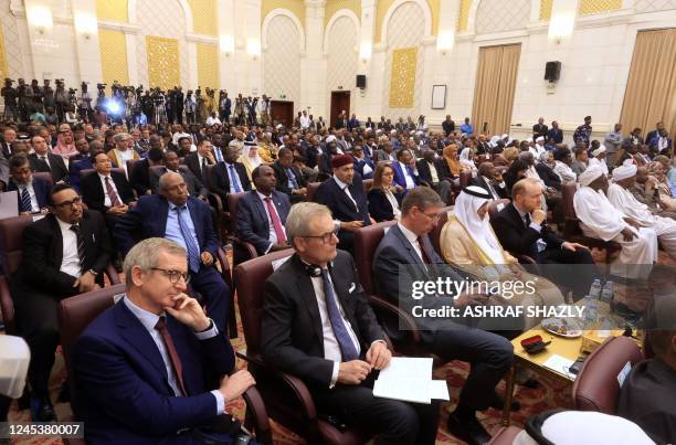 Ambassadors to Sudan of the EU Aidan O'Hara , the UK Giles Lever , the UAE Hamad Al Junaibi , and the US John T. Godfrey attend the signing ceremony...