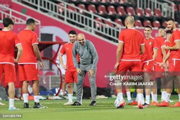 Morocco's coach Walid Regragui attends a training session at the Al Duhail SC Stadium in Doha on December 5 on the eve of the Qatar 2022 World Cup...