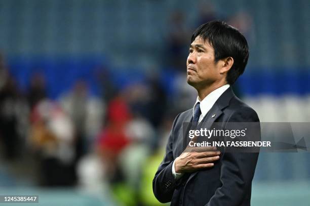 Japan's coach Hajime Moriyasu greets the crowd after his team's loss in the Qatar 2022 World Cup round of 16 football match between Japan and Croatia...