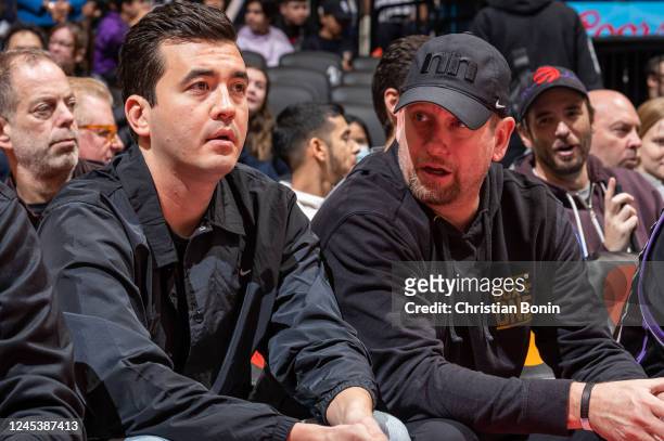 Head Coach of the Toronto Raptors Nick Nurse and General Manager Bobby Webster sitting courtside during an NBA G League game against the Greensboro...