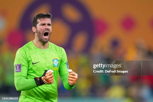 Goalkeeper Alisson of Brazil cheers over the second goal from Neymar during the FIFA World Cup Qatar 2022 Round of 16 match between Brazil and South...