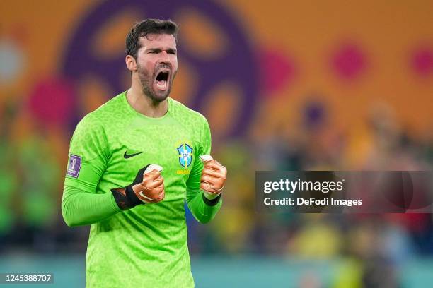 Goalkeeper Alisson of Brazil cheers over the second goal from Neymar during the FIFA World Cup Qatar 2022 Round of 16 match between Brazil and South...