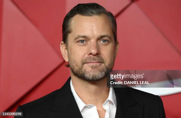 Actor Joshua Jackson poses on the red carpet upon arrival at The 2022 Fashion Awards in London on December 5, 2022. - - RESTRICTED TO EDITORIAL USE -...