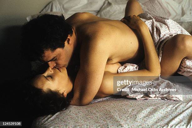 Jamie Lee Curtis in love scene with Ray Liotta in a scene from the film 'Dominick And Eugene', 1988.