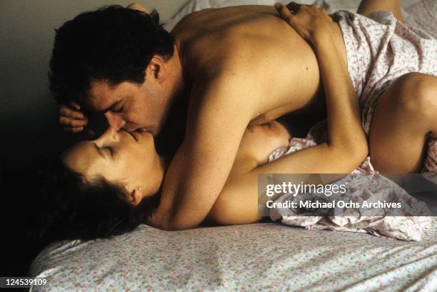 Jamie Lee Curtis in love scene with Ray Liotta in a scene from the film 'Dominick And Eugene', 1988.