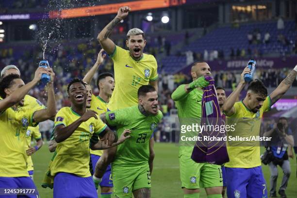 Marquinhos, Vinicius Junior, Bruno Guimaraes, Ederson, Weverton, Lucas Paqueta of Brazil celebrate after the FIFA World Cup Qatar 2022 Round of 16...