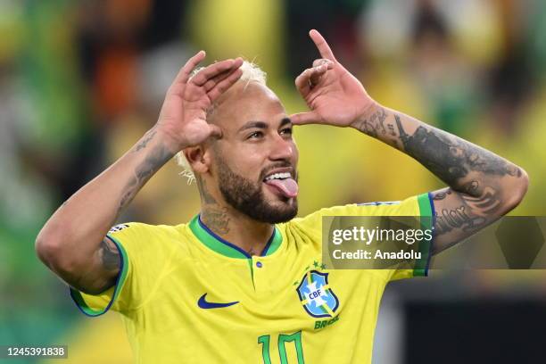 Neymar of Brazil celebrates at the end of the FIFA World Cup Qatar 2022 Round of 16 match between Brazil and South Korea at Stadium 974 on December...