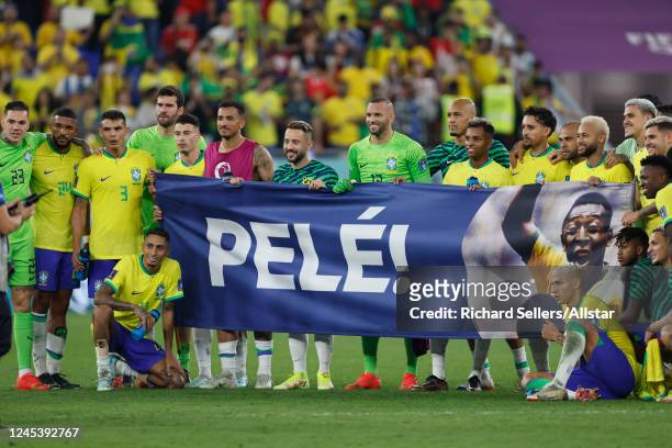 Brazilian players with Pele banner after the FIFA World Cup Qatar 2022 Round of 16 match between Brazil and South Korea at Stadium 974 on December...