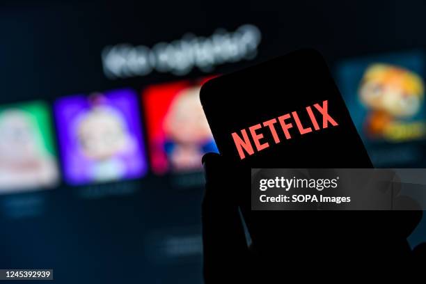 In this photo illustration a Netflix logo seen displayed on a smartphone.