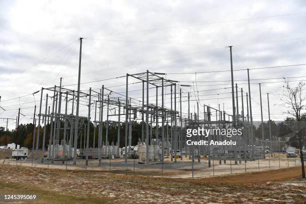 View of the substation while work is in progress as tens of thousands are without power on Moore County after an attack at two substations by Duke...