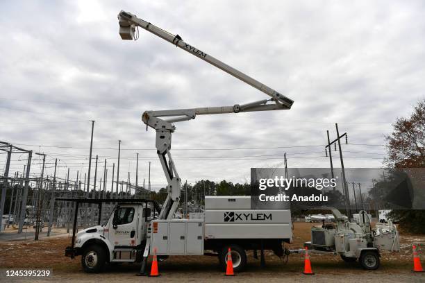 View of the substation while work is in progress as tens of thousands are without power on Moore County after an attack at two substations by Duke...