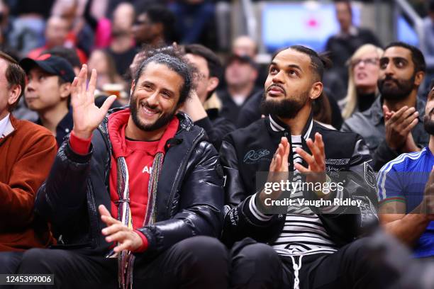 Player Colin Kaepernick and NHL player Akim Aliu attend a game between the Boston Celtics and the Toronto Raptors on December 5, 2022 at the...