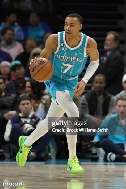 Bryce McGowens of the Charlotte Hornets dribbles the ball against the LA Clippers on December 5, 2022 at Spectrum Center in Charlotte, North...