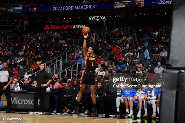 Jalen Johnson of the Atlanta Hawks shoots a three point basket during the game against the Oklahoma City Thunder on December 5, 2022 at State Farm...