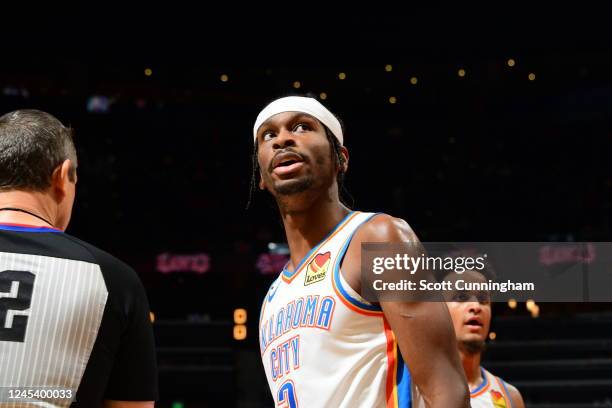 Shai Gilgeous-Alexander of the Oklahoma City Thunder looks on during the game against the Atlanta Hawks on December 5, 2022 at State Farm Arena in...