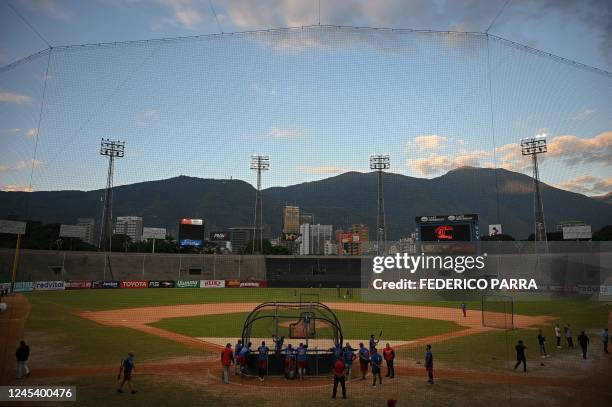 Players of Tiburones de la Guaira attend a training session before the Venezuelan Baseball League game against Leones del Caracas, at the...