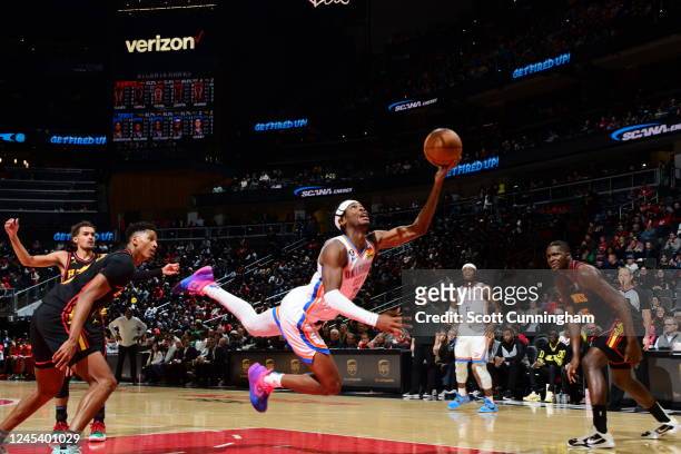 Shai Gilgeous-Alexander of the Oklahoma City Thunder shoots the ball during the game against the Atlanta Hawks on December 5, 2022 at State Farm...