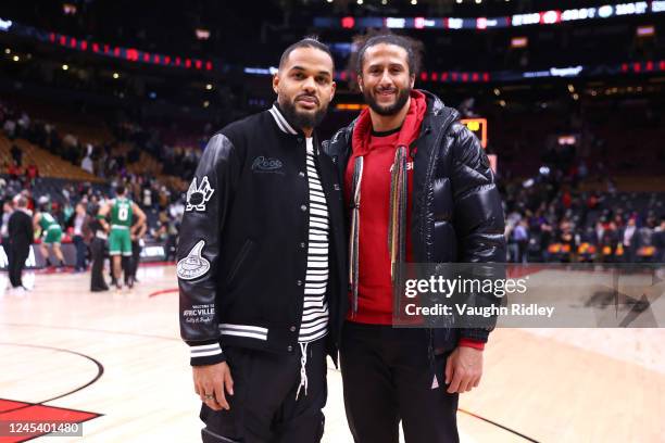 Player Akim Aliu and NFL player Colin Kaepernick pose for a photo after the game between the Boston Celtics and the Toronto Raptors on December 5,...
