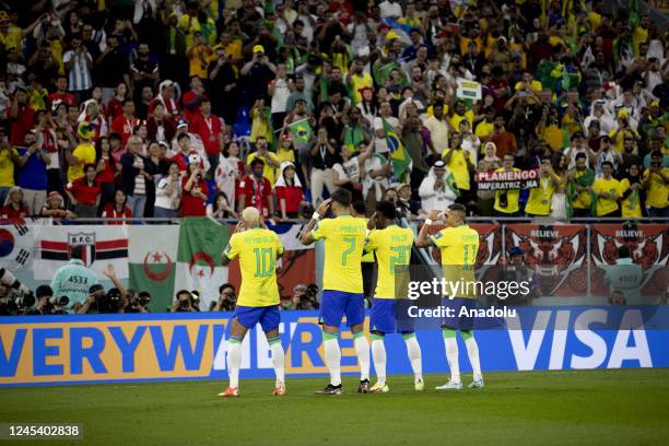 Neymar , Lucas Paqueta , Vinicius Junior and Raphinha of Brazil celebrate after scoring goal during the FIFA World Cup Qatar 2022 Round of 16 match...