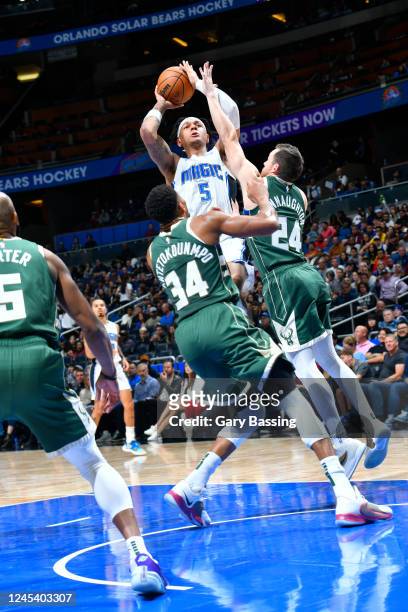 Paolo Banchero of the Orlando Magic shoots the ball during the game against the Milwaukee Bucks on December 5, 2022 at Amway Center in Orlando,...