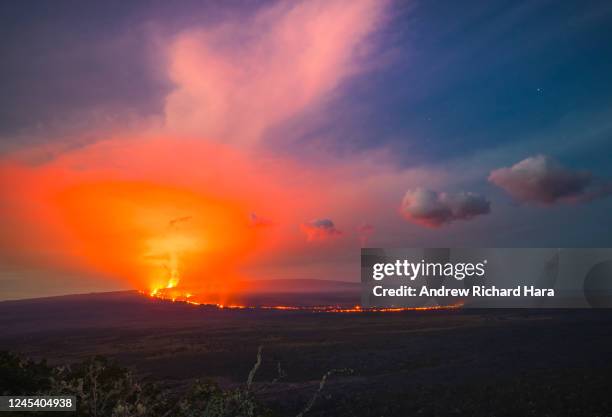 Lava fissures flow downslope from the north flank of Mauna Loa Volcano on December 5, 2022 in Hilo, Hawaii. For the first time in almost 40 years,...