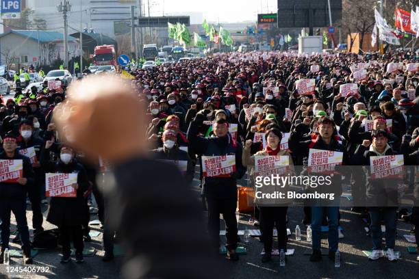 Members of the Korean Confederation of Trade Unions shout slogans during a protest in Uiwang, South Korea, on Tuesday, Dec. 6, 2022. A major umbrella...