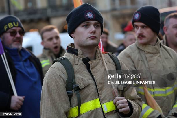 Firefighters rally to lobby Parliament over a pay dispute in central London on December 6, 2022. - Fire Brigades Union staff have rejected a 5% pay...
