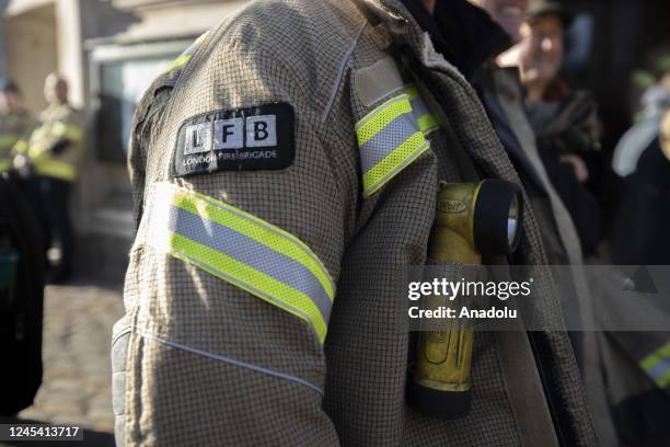 Firefighters gather to hold a demonstration in front of the Methodist Church Hall building before going on strike due to the disagreement over the...