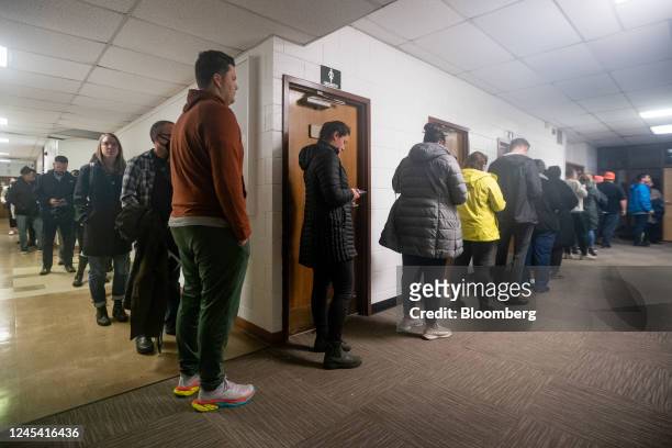 Voters wait in line at a polling location during the runoff election in Atlanta, Georgia, US, on Tuesday, Dec. 6, 2022. Georgia voters Tuesday will...